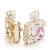 llaveroPerfume botella con cristales y flores - llavero