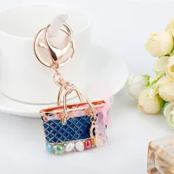 Hobbies & ColeccionesBolsa de cristal - llavero de oro