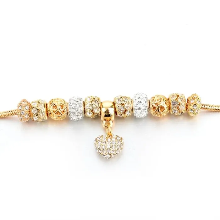 PulserasElegante pulsera de oro con cuentas de cristal y corazón