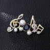 Crystal musical notes - elegant broochBrooches