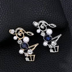 BrochesMusical notes - crystal brooch
