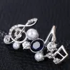 Crystal musical notes - elegant broochBrooches