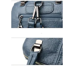 MochilasLeather shoulder bag - with multi zippers / hand strap