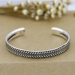 Stainless steel bracelet - with leaf pattern - open design - unisexBracelets