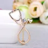 BrochesStethoscope shaped brooch with crystal