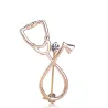BrochesStethoscope shaped brooch with crystal