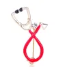 BrochesStethoscope shaped brooch with crystal