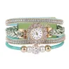 PulseraMultilayer bracelet with a round watch - crystals / beads