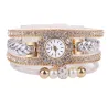 PulseraMultilayer bracelet with a round watch - crystals / beads