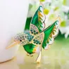 Elegant brooch - with green crystal birdBrooches