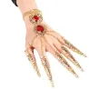 PulseraAnillo de cinco dedos - con cadenas - pulsera de oro - flores huecas / cristales rojos