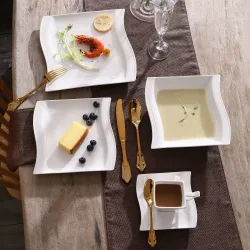 CubiertosVajilla elegante - vajilla de porcelana blanca - tazas - platillos - platos