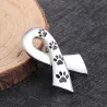 BrochesBroche en forma de cinta - estampado de pata de mascota