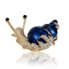 BrochesEsmalte / cristal caracol - broche