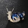 BrochesEsmalte / cristal caracol - broche