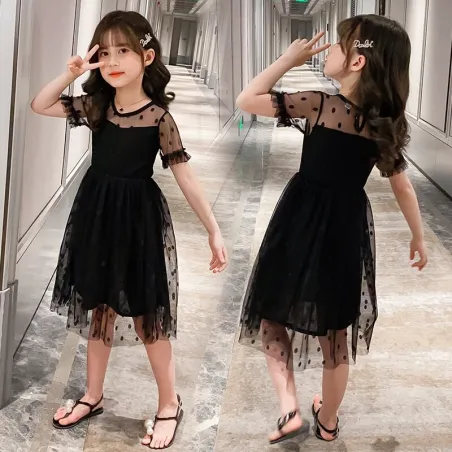 RopaElegante vestido negro de gasa con lunares