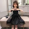 RopaElegante vestido negro de gasa con lunares