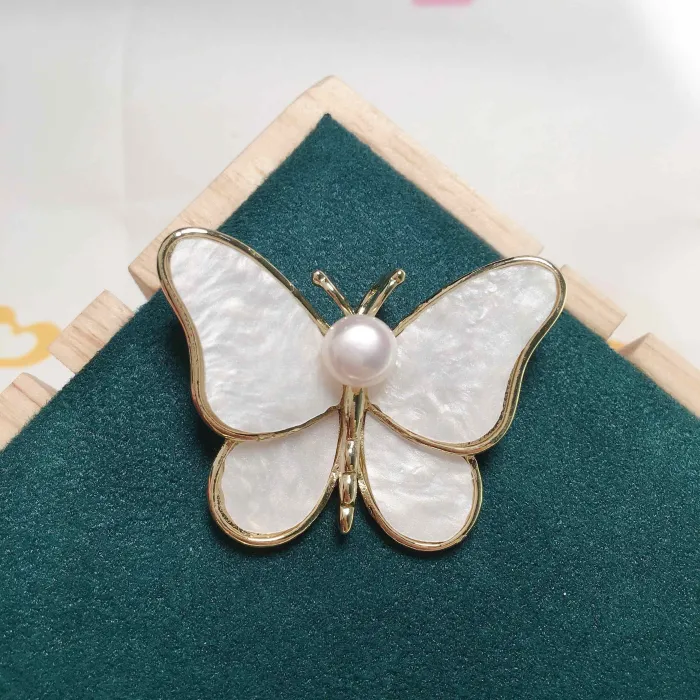BrochesMariposa de concha con perla - broche