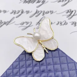 BrochesBroche mariposa concha blanca - con perla -