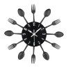 RelojesReloj de pared moderno - con cubiertos de cocina.