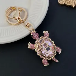 llaveroLlavero tortuga de cristal - rosa - blanco - turquesa - verde