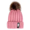 Warm winter wool hat with pom pomHats & Caps