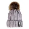 Warm winter wool hat with pom pomHats & Caps